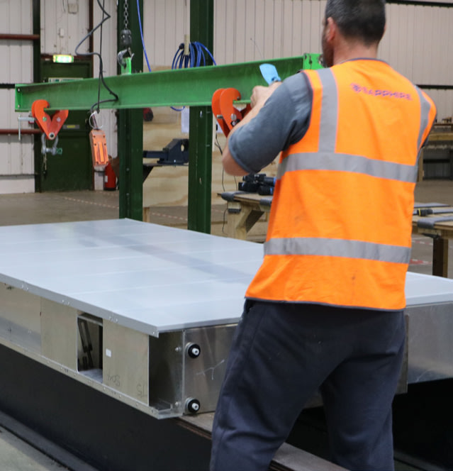Offsite balcony manufacture with soffits being fitted